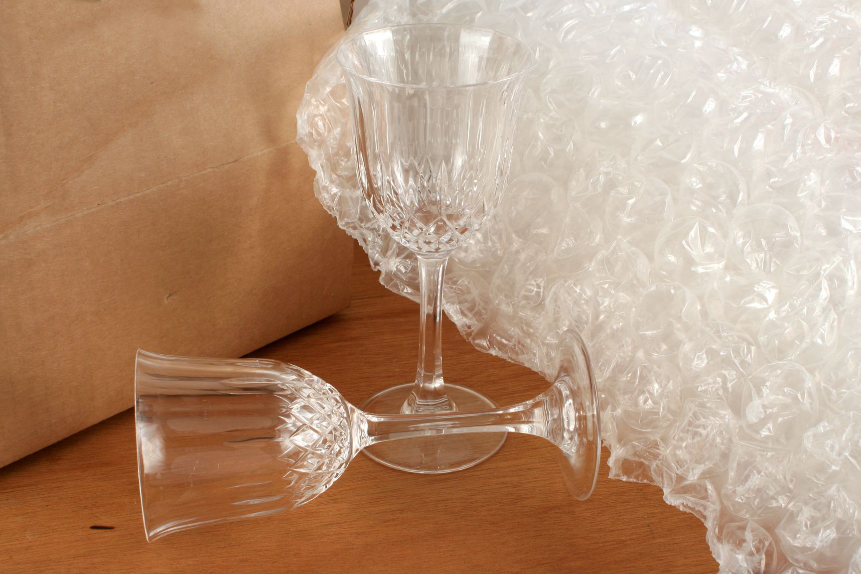 Crystal glasses surrounded by a bubble wrap
