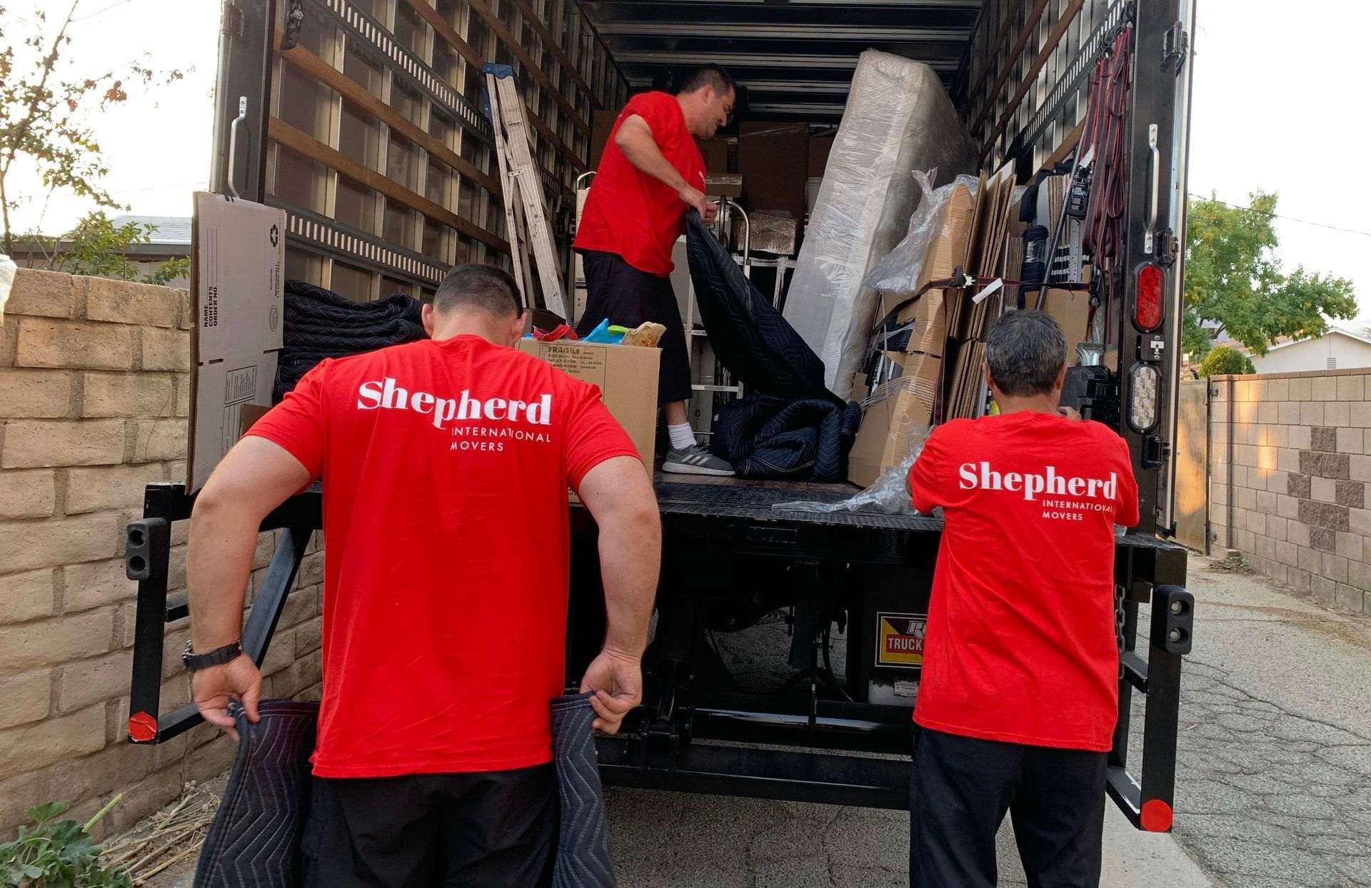 Shepherd movers loading the truck for international moving