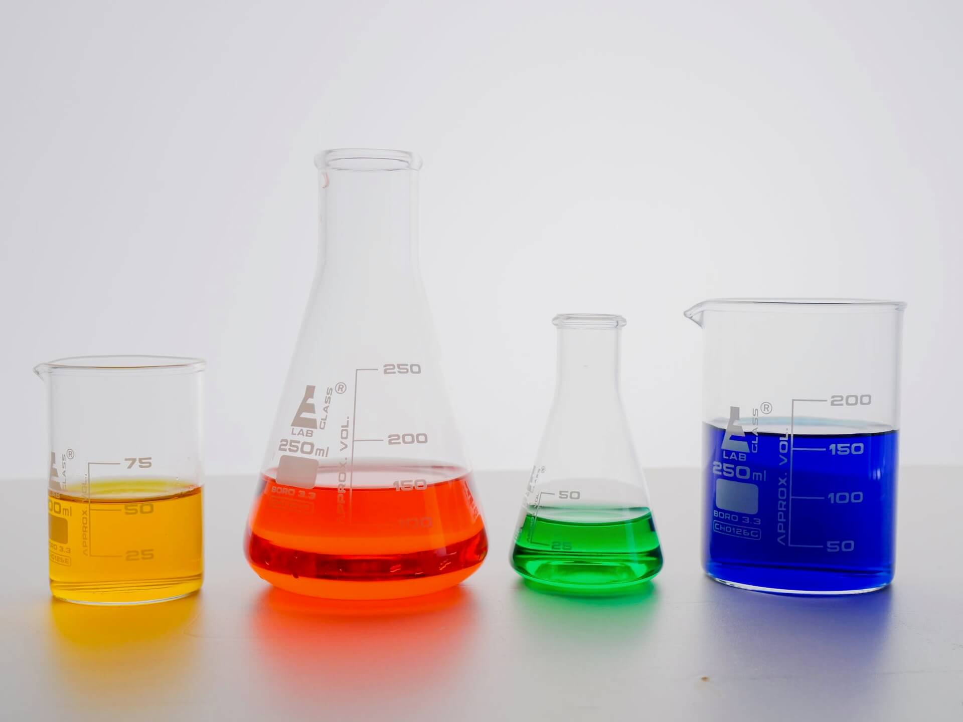 Colorful liquid in laboratory glassware