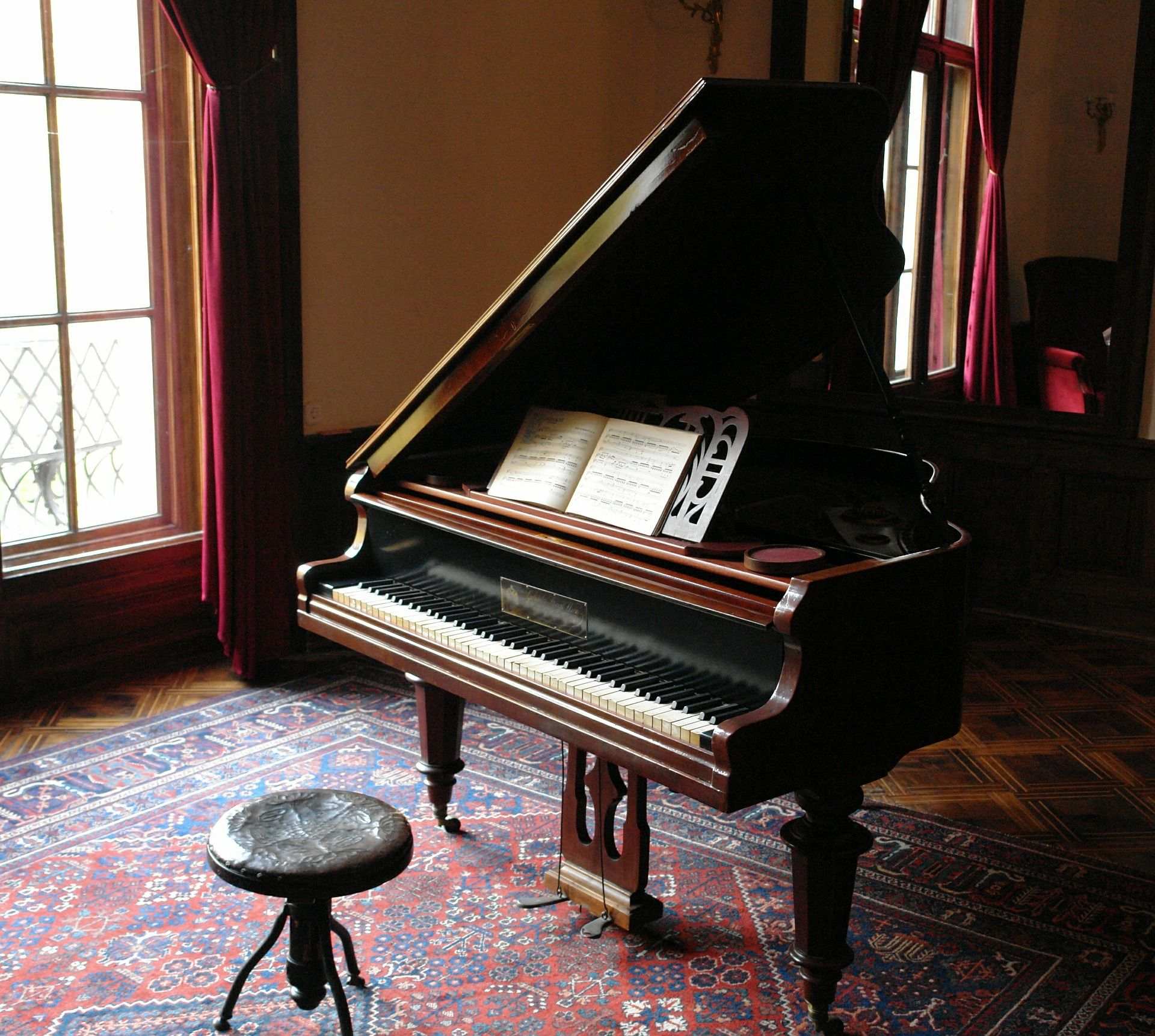 grand piano and a carpet