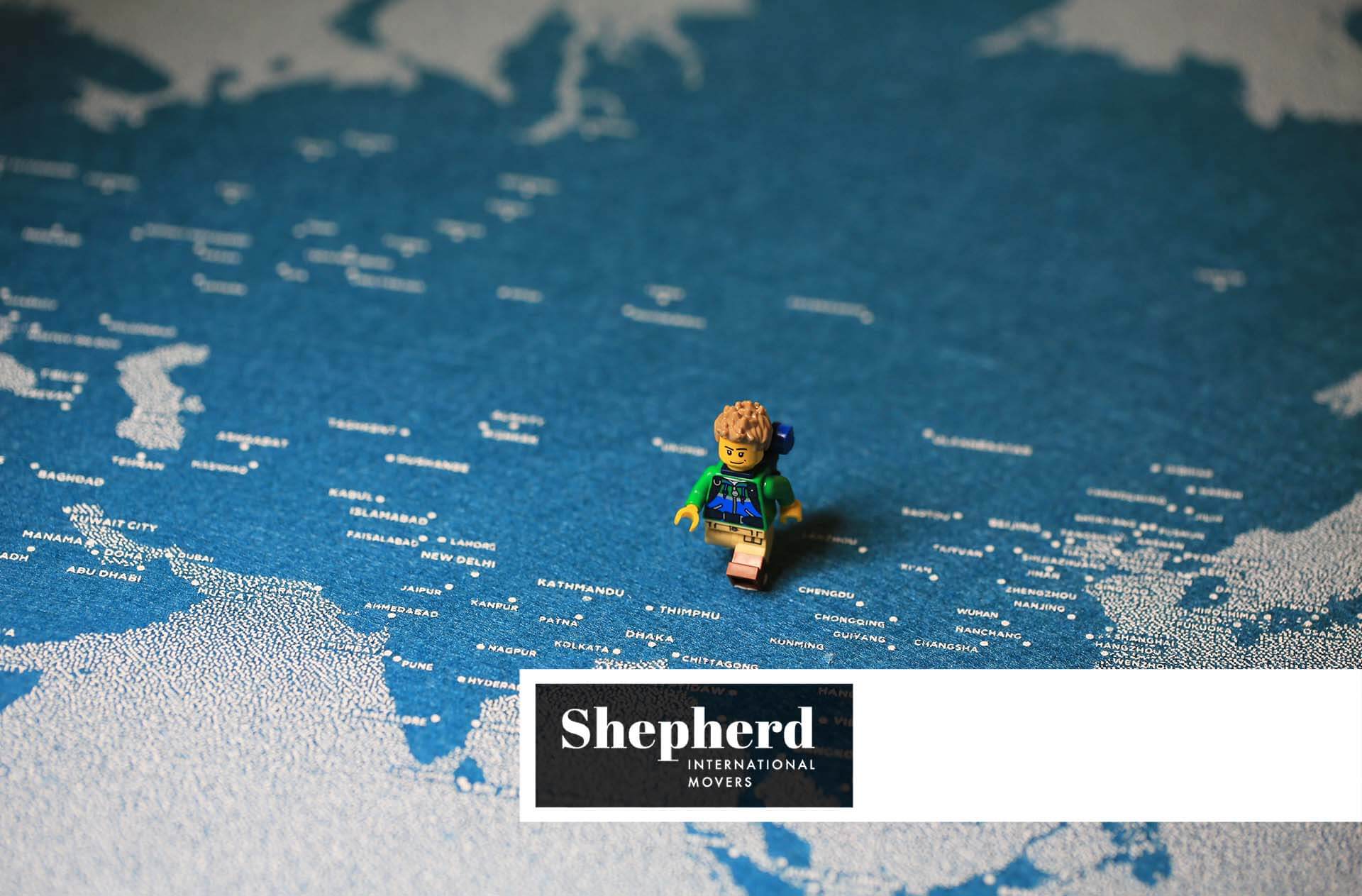 moving overseas Shepherd international logo