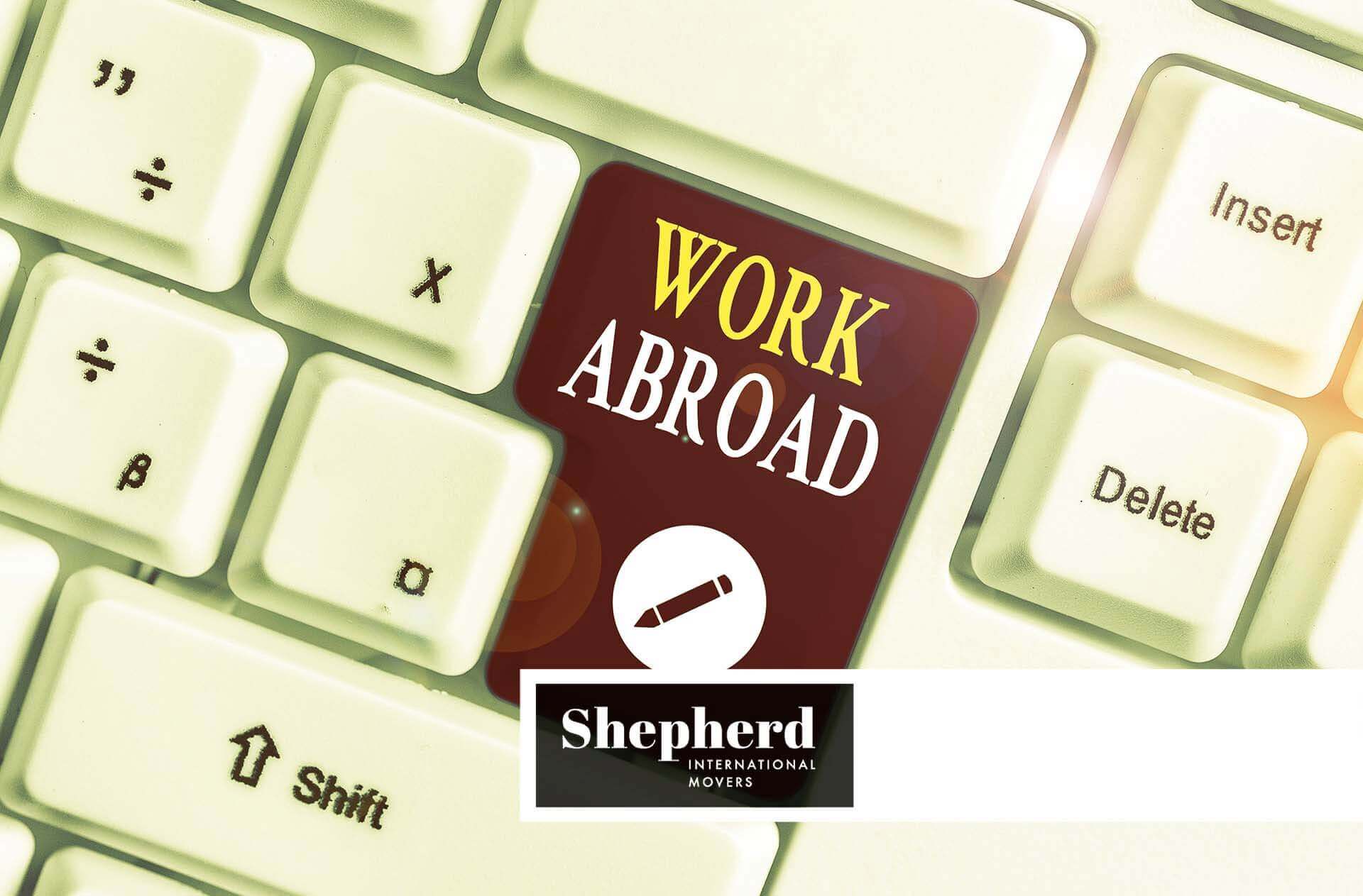 Work abroad button on a keyboard