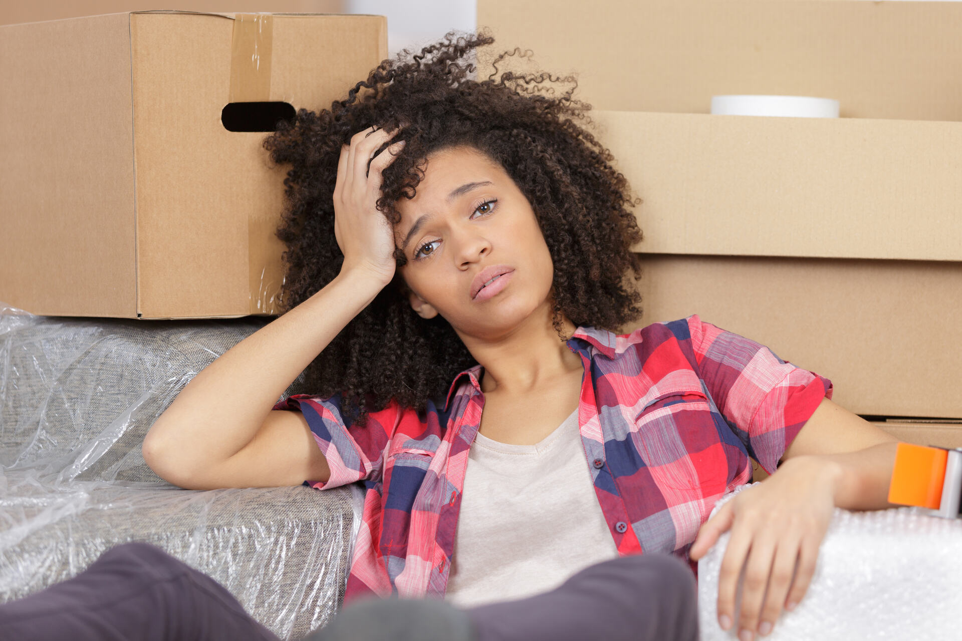 A woman feeling stress when moving overseas