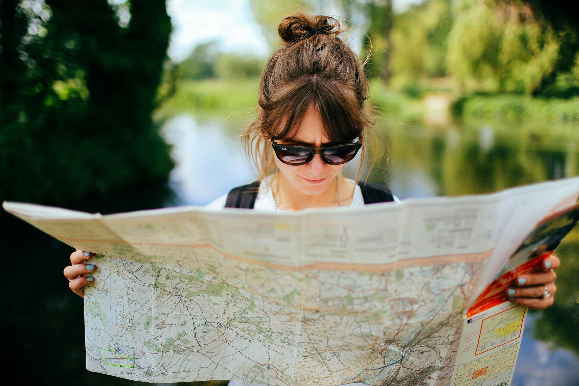 Woman with a map ready to move to Europe