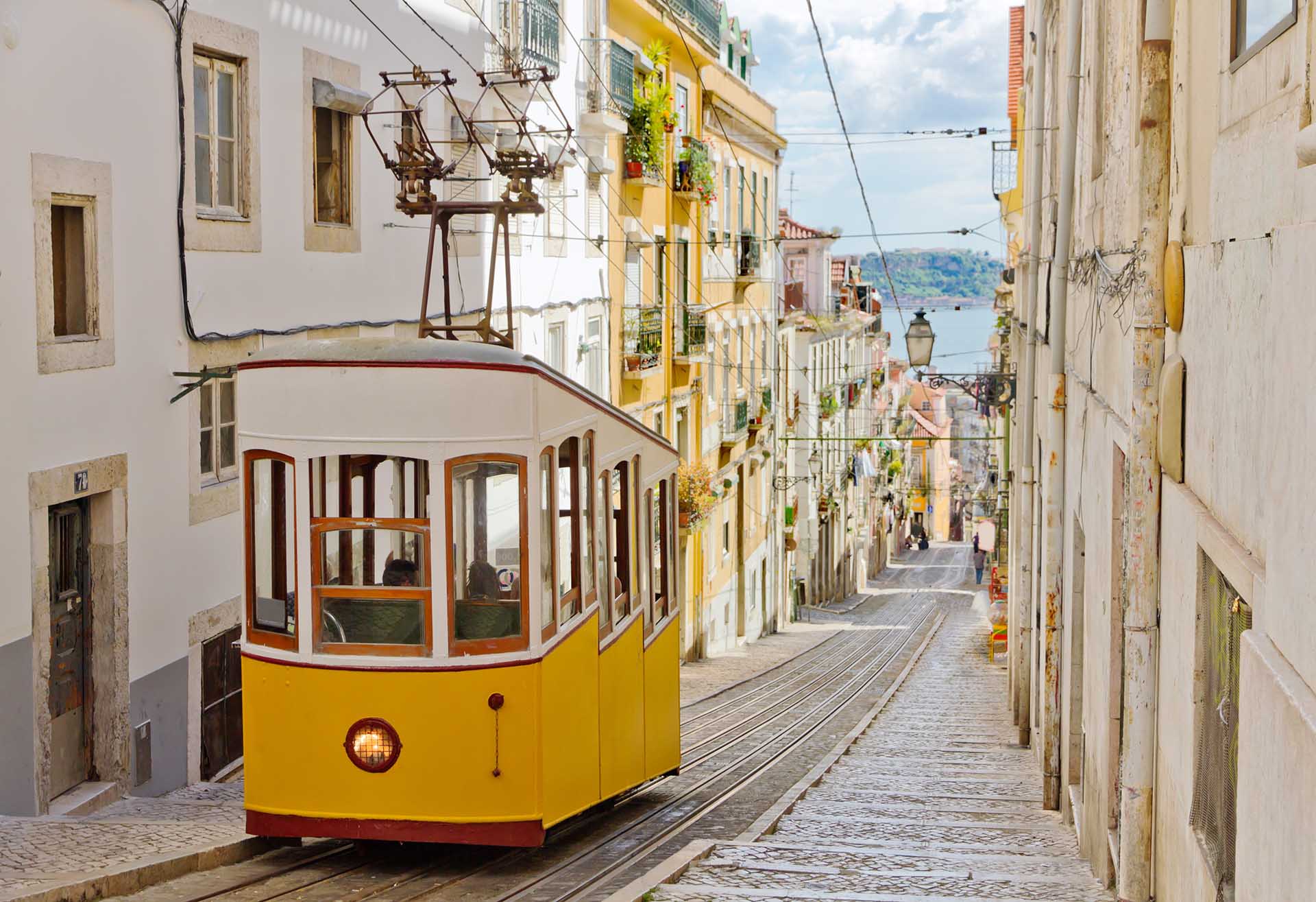 Lisbon's Gloria funicular classified as a national monument opened 1885 located on the west side of the Avenida da Liberdade connects downtown withBairro Alto.