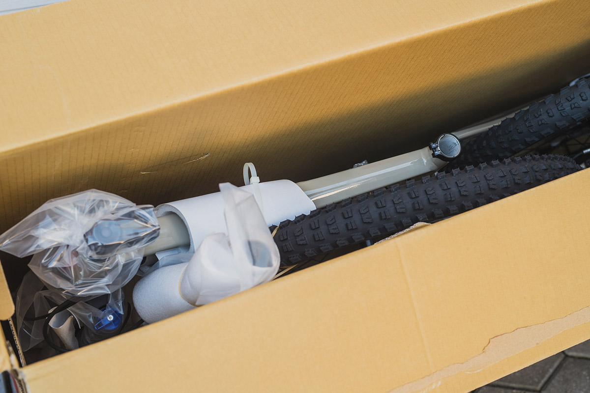 A bike packed in a box before moving overseas